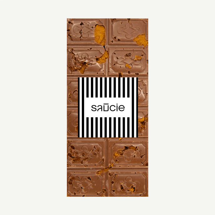 A decadent Belgian milk chocolate block loaded with Biscoff biscuit pieces and caramel crunch, sprinkled with sea salt.