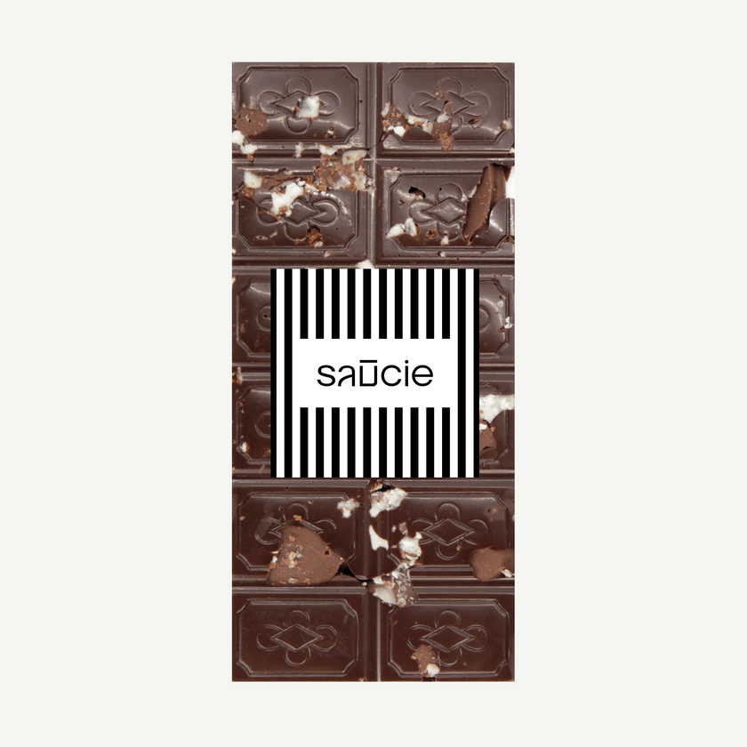 Dark chocolate mint slice block served on a plate – indulgent handmade treat with mint filling and biscuit crunch