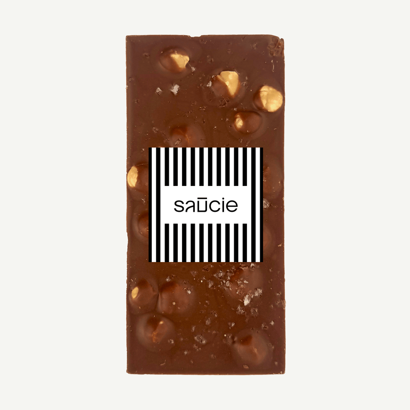 Premium milk chocolate hazelnut caramel crunch and sea salt block in clear packaging with product sticker – handmade in Geelong