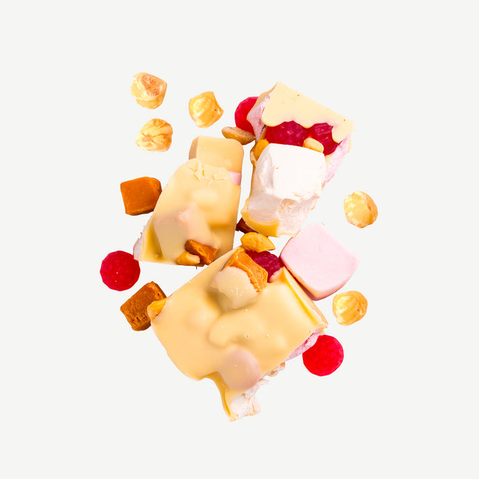 Premium white chocolate rocky road with marshmallows, raspberry lollies, caramel fudge and cashews – handmade in Geelong