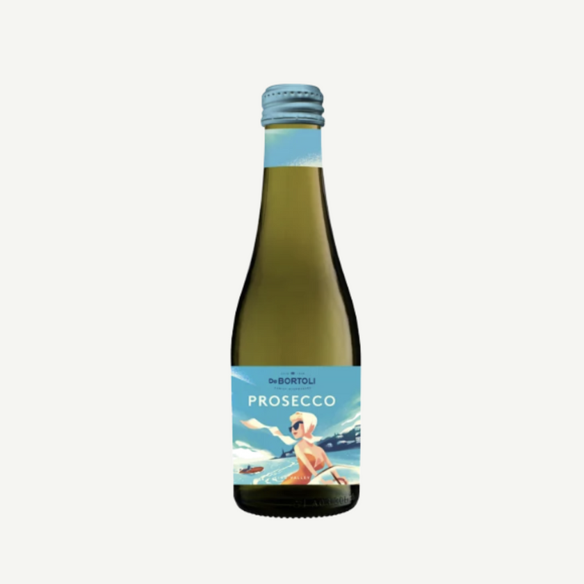 Bottle of prosecco with a label featuring a woman in a bikini on a white - hampers, corporate gifts, celebrations