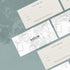 Several gift vouchers with the brand name 'saucie' laid out on a textured grey surface.