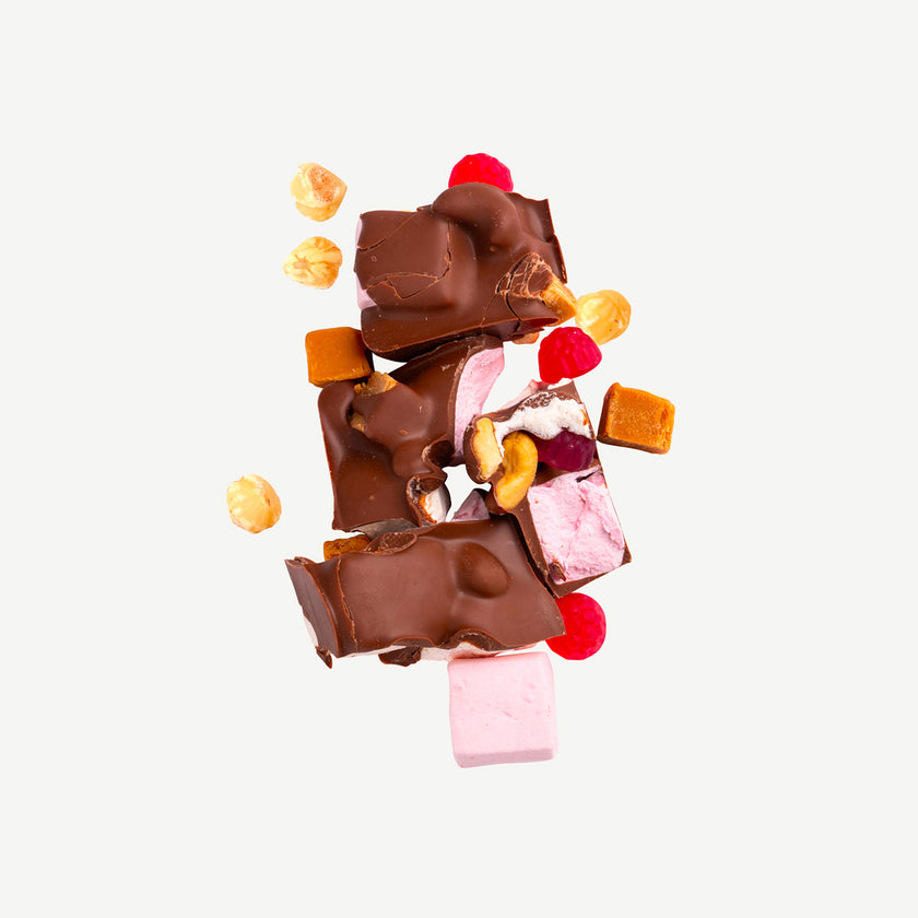 Premium milk chocolate gluten free rocky road with marshmallows, roasted hazelnuts, caramel fudge and raspberry lollies – handmade in Geelong
