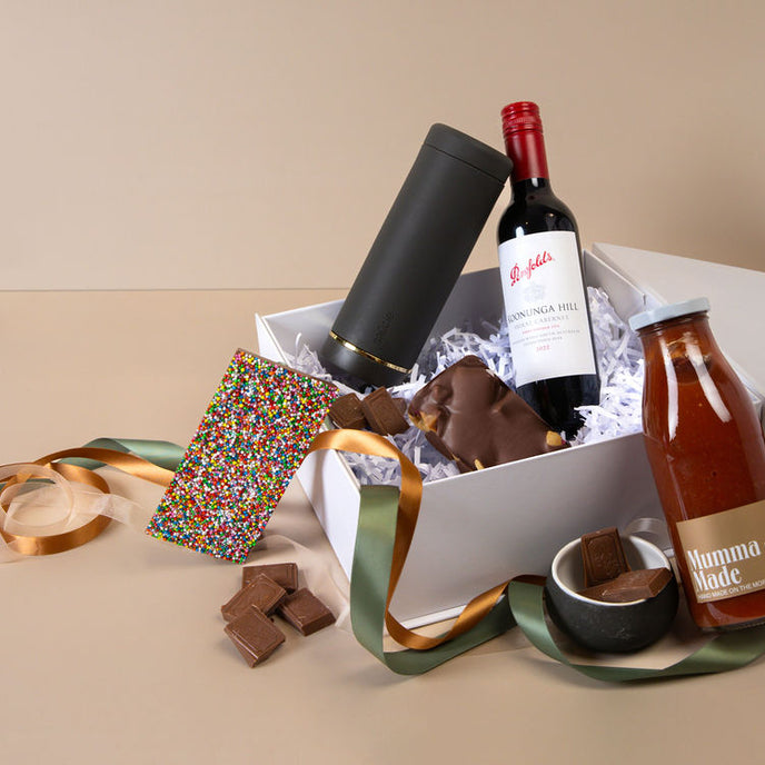 Navy blue reusable Saucie Bottle with labelled lid included in Cheers to You Hamper – practical and stylish