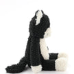Plush toy skunk on a white background