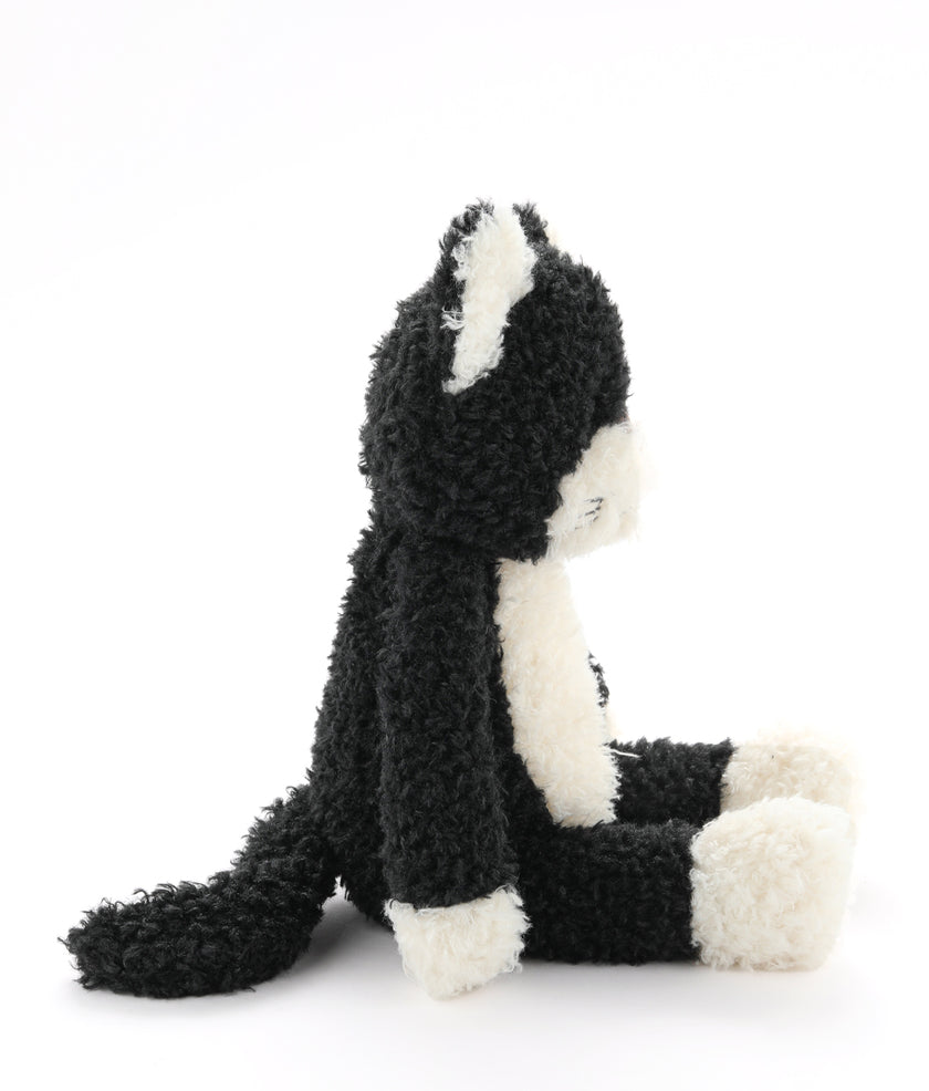 Plush toy skunk on a white background