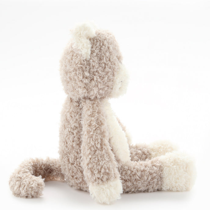 Plush toy dog on a white background