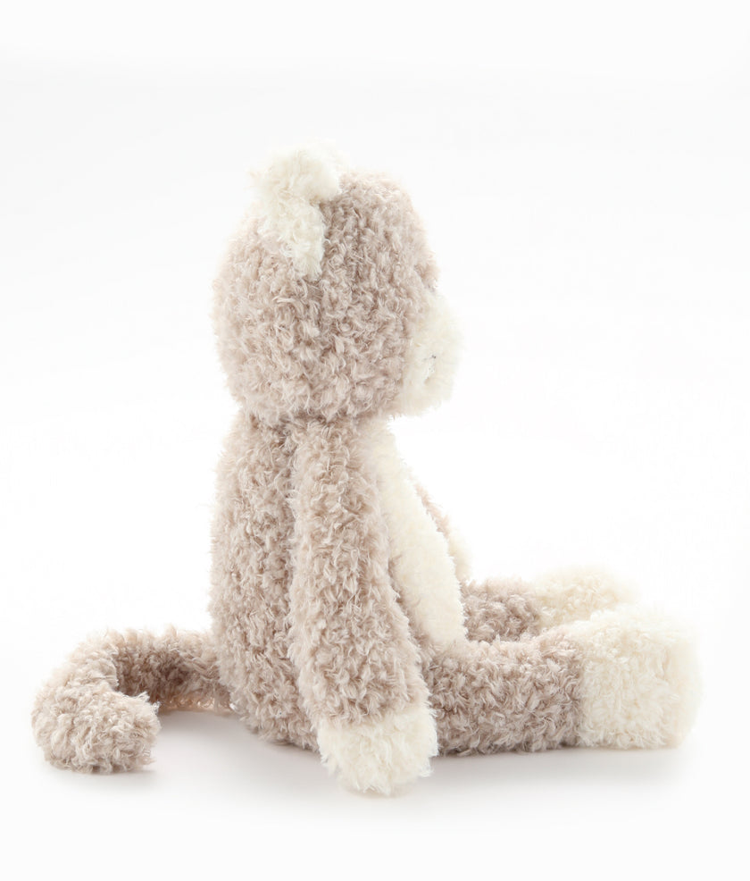 Plush toy dog on a white background