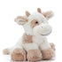 Plush cow toy on a white background