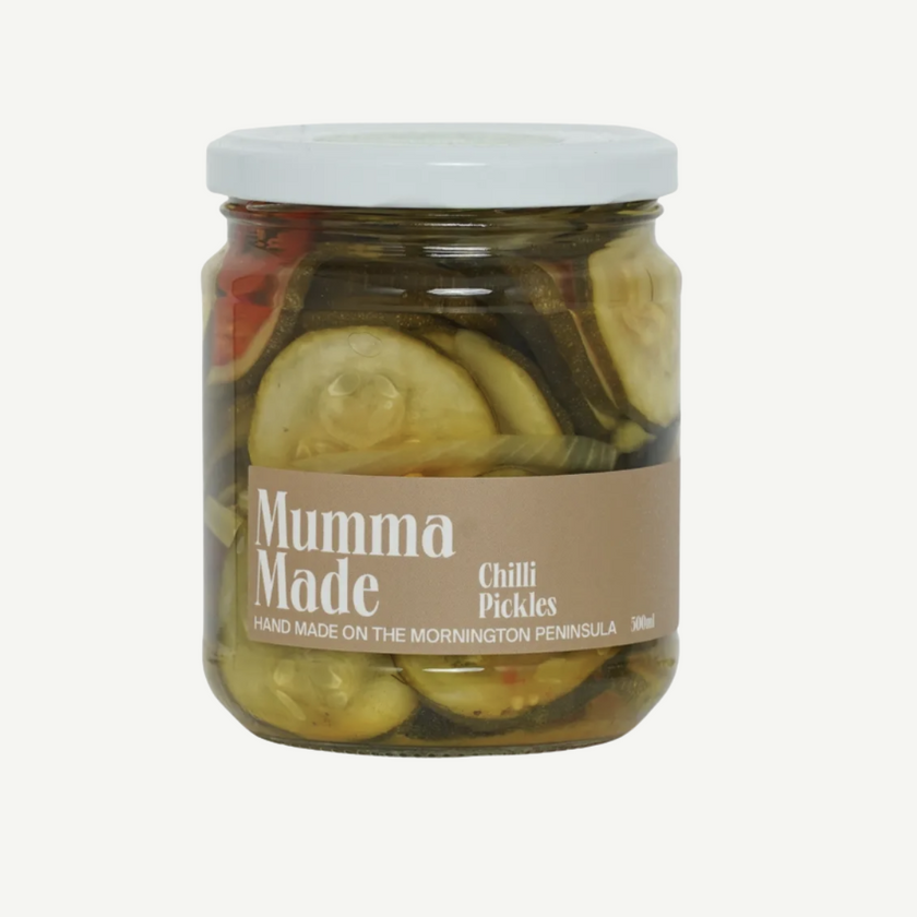Jar of pickles with a 'Mumma Made' label on a white background