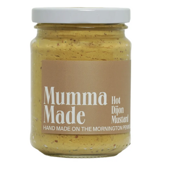 Jar of 'Mumma Made' hot Dijon mustard on a white background