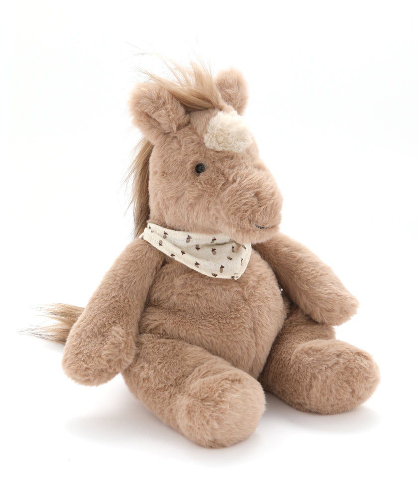 Plush horse toy with a bandana on a white background