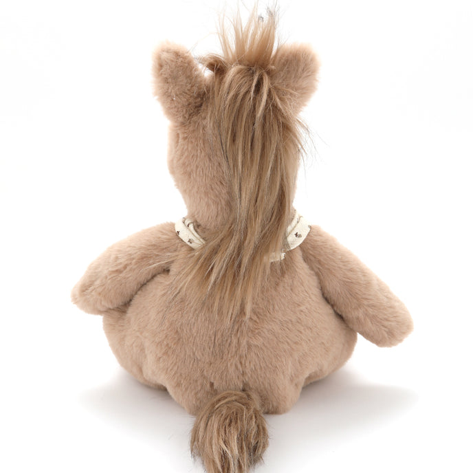 Plush horse toy with a braided mane on a white background