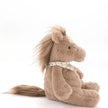 Plush horse toy with a white background
