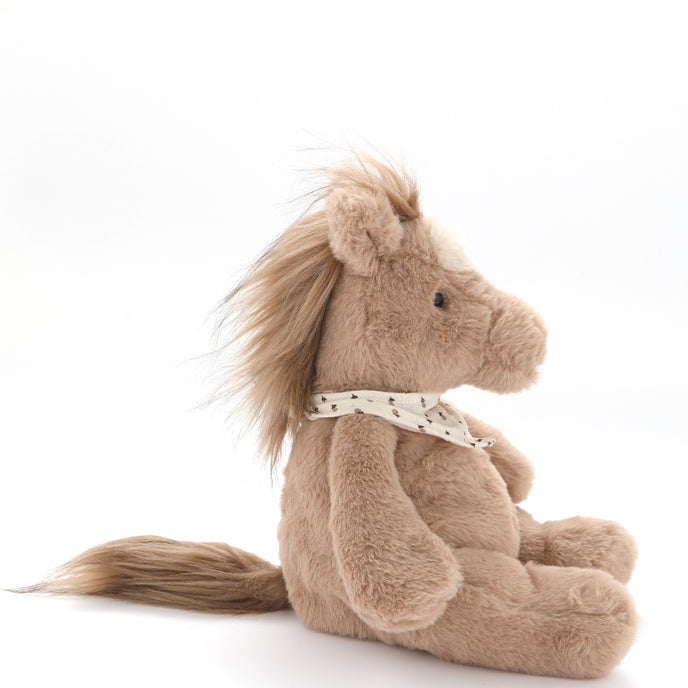 Plush horse toy with a white background