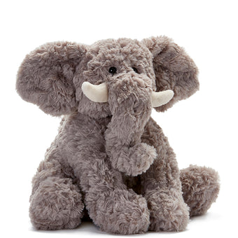 Plush elephant toy on a white background