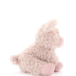 Fluffy pink plush toy on a white background