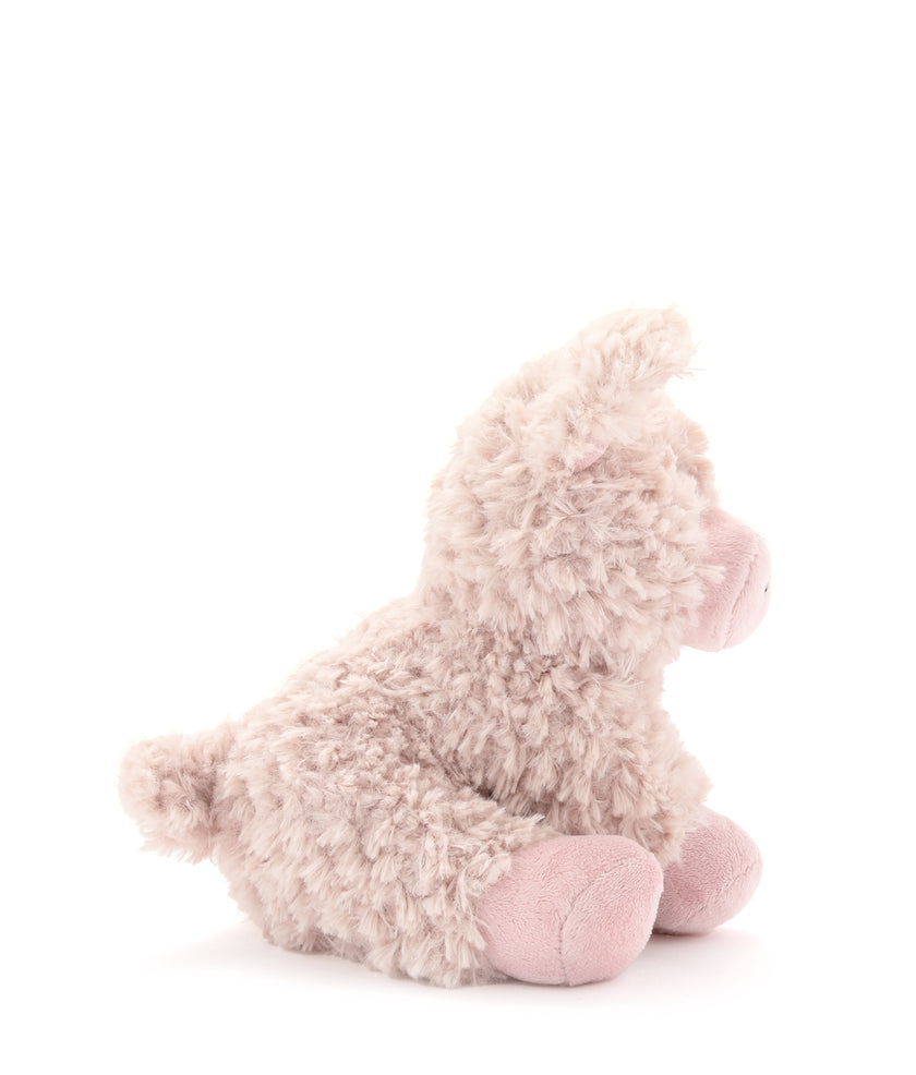 Fluffy pink plush toy on a white background