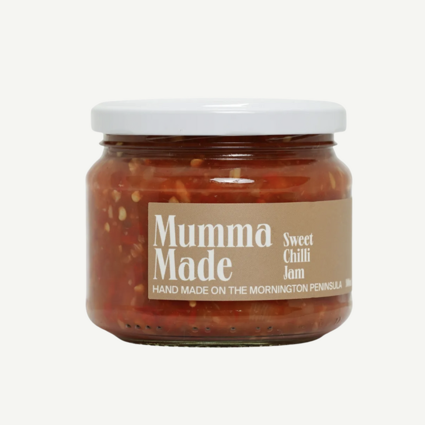 Jar of 'Mumma Made' sweet chilli jam on a white background