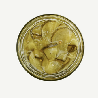 Jar of pickled vegetables on a white background