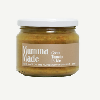 Jar of 'Mumma Made' green tomato pickle on a white background