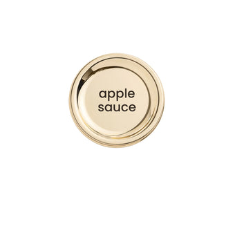 Condiments sauce bottle with apple sauce lid