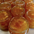 Jars of pickled vegetables on a surface