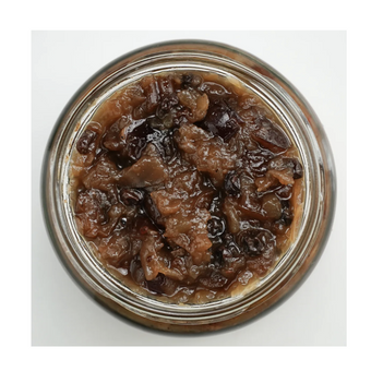 Jar of brown preserve on a white background