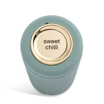 Condiments bottle with Gold container lid with 'sweet chilli' text on a white background. Sauce bottle